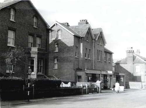 Big Houses - one with shops 1950s