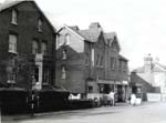 Big Houses - one with shops 1950s